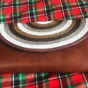 Crescent shape hand made gold and white clutch bag